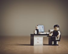 Why do companies adopt shocking mass layoffs?